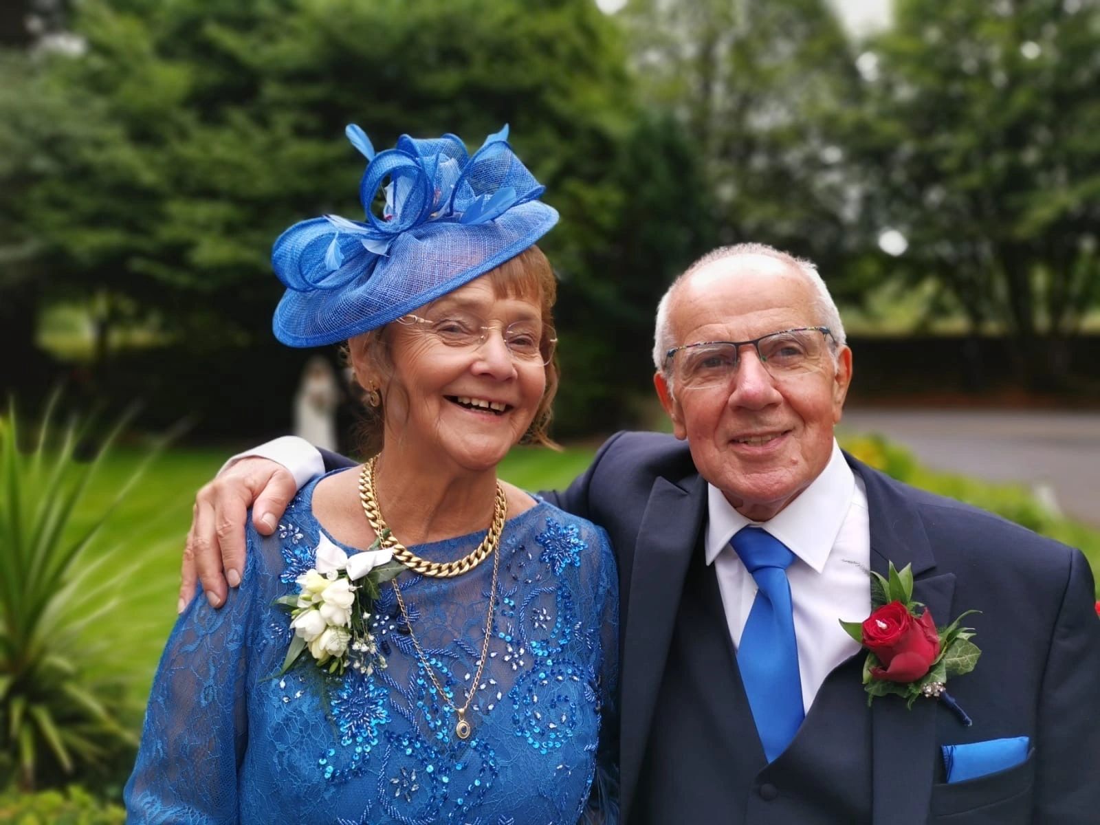 John Fulgoni, BSc FBCO, founder of Fulgoni Opticians, with his wife Wendy who ran the front desk for thirty years, photographed at the 50-year celebration